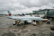 Commercial regional jet aircraft on airport tarmac representing aerospace trade discussions